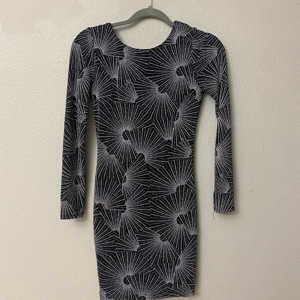 Black mini dress with a deep V in the back